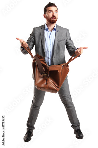 Photo: Business man with briefcase standing on white background Business man with briefcase standing on white background