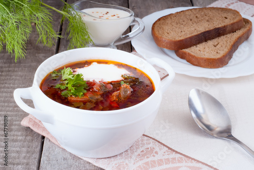 Photo: Borsch, soup from a beet, meat and cabbage with tomato sauce Borsch, soup from a beet, meat and cabbage with tomato sauce