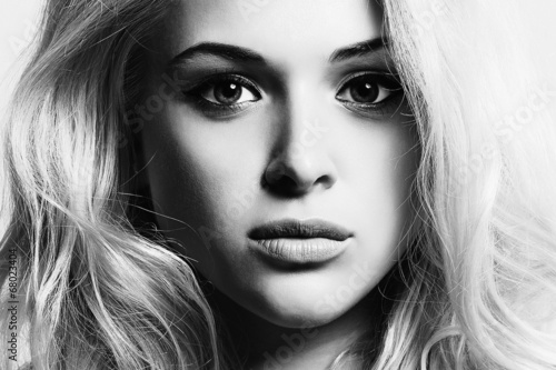 Photo: Beautiful Face of Young Woman.Blond girl.close-up Beautiful Face of Young Woman.Blond girl.close-up
