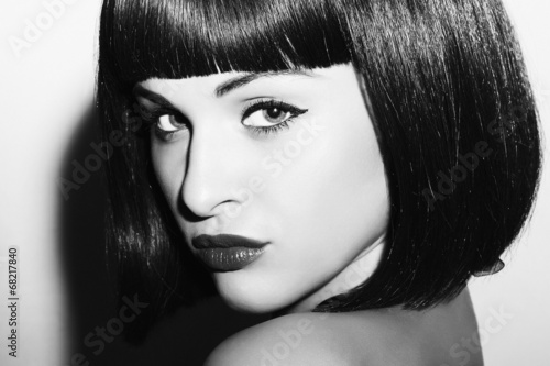 Photo: monochrome portrait.Beautiful Brunette Girl.Healthy Hair woman monochrome portrait.Beautiful Brunette Girl.Healthy Hair woman