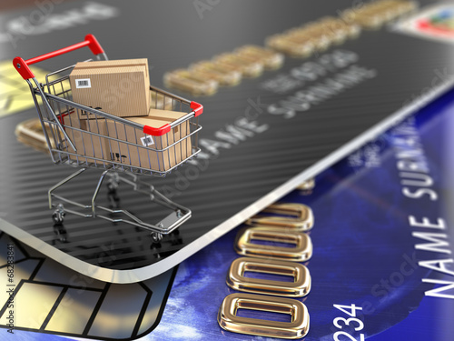 Illustration: E-commerce. Shopping cart and credit cards. E-commerce. Shopping cart and credit cards.
