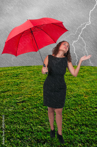 Photo: Woman Holding Umbrella Woman Holding Umbrella