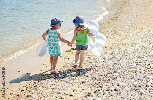Photo: friends on the summer beach friends on the summer beach