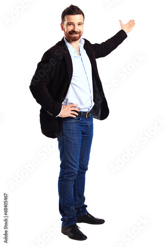 Photo: Happy business man presenting and showing Happy business man presenting and showing
