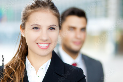 Photo: Two business people outdoor Two business people outdoor