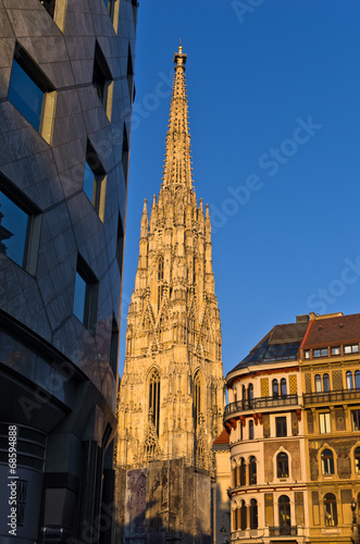 Photo: Sunset at downtown of Vienna near Saint Stephan's cathedral Sunset at downtown of Vienna near Saint Stephan's cathedral
