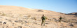 Soldiers patrol in desert Soldiers patrol in desert