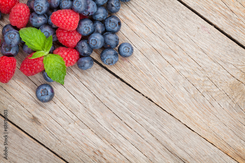 Photo: Blueberries and raspberries Blueberries and raspberries