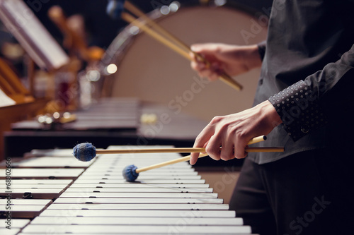 Fototapeta na wymiar Hands of musician playing the vibraphone