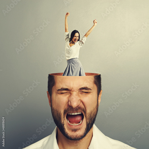 Photo: stressed young man and excited woman stressed young man and excited woman