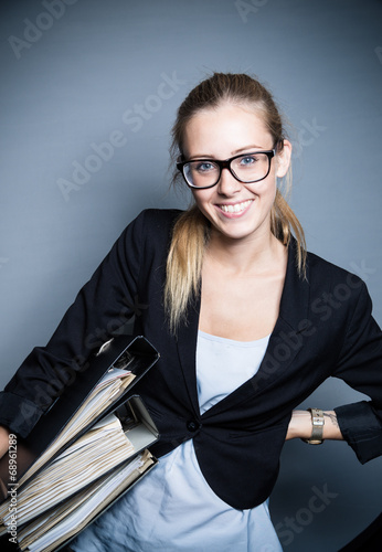 Photo: young attractive business woman young attractive business woman
