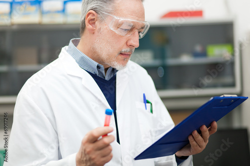 Photo: Researcher working in a laboratory Researcher working in a laboratory