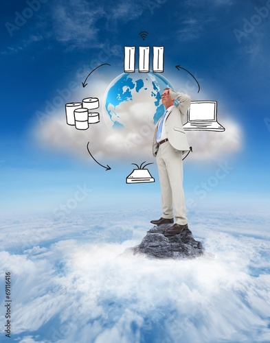 Photo: Composite image of thinking businessman Composite image of thinking businessman