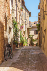 Sunny streets of Italian city Pienza in Tuscany