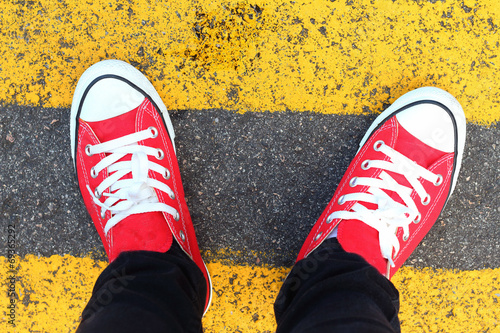 Photo: Shoes red on a black ground. Shoes red on a black ground.