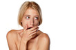 stunned and shameful young blonde on white background