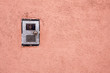 Intercom on red wall Intercom on red wall