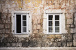 wall of an old stone house wall of an old stone house