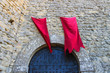 Red flags over the gates fortresses in San Marino. The Republic Red flags over the gates fortresses in San Marino. The Republic