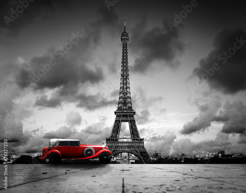 Effel Tower, Paris, France and retro red car. Black and white