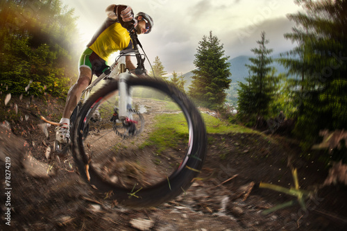  Sport. Mountain Bike cyclist riding single track