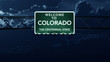 Colorado USA State Welcome to Highway Road Sign at Night Colorado USA State Welcome to Highway Road Sign at Night