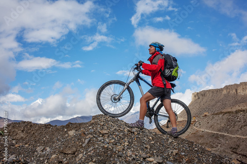  Biker-girl in Himalaya mountains, Anapurna region