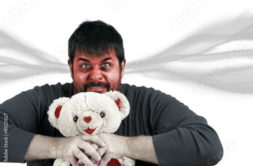 Very angry man with teddy bear - 81321627