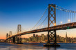 San Francisco skyline and Bay Bridge at sunset, California San Francisco skyline and Bay Bridge at sunset, California