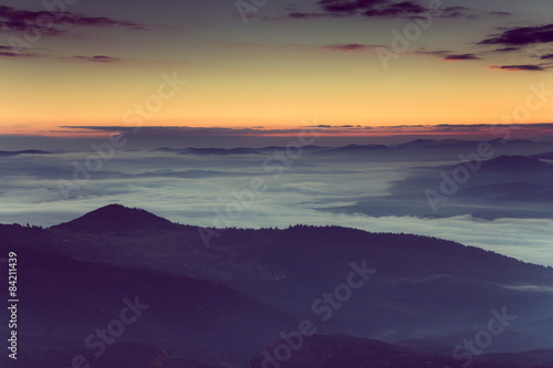 Beautiful foggy morning  in the mountains.