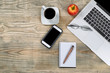 Tidy workspace with red apple and coffee for break Tidy workspace with red apple and coffee for break