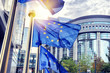 EU flags waving in front of European Parliament building in Brus EU flags waving in front of European Parliament building in Brus