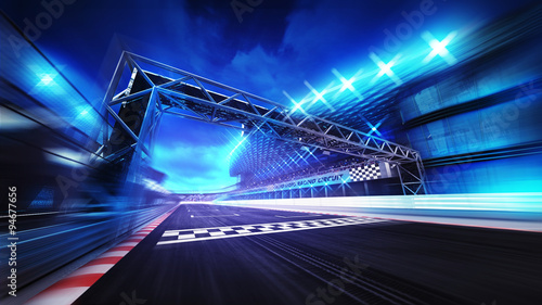 finish gate on racetrack stadium and spotlights in motion blur