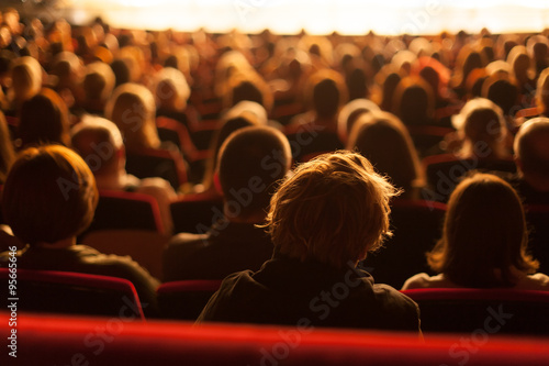 audience watching theater play