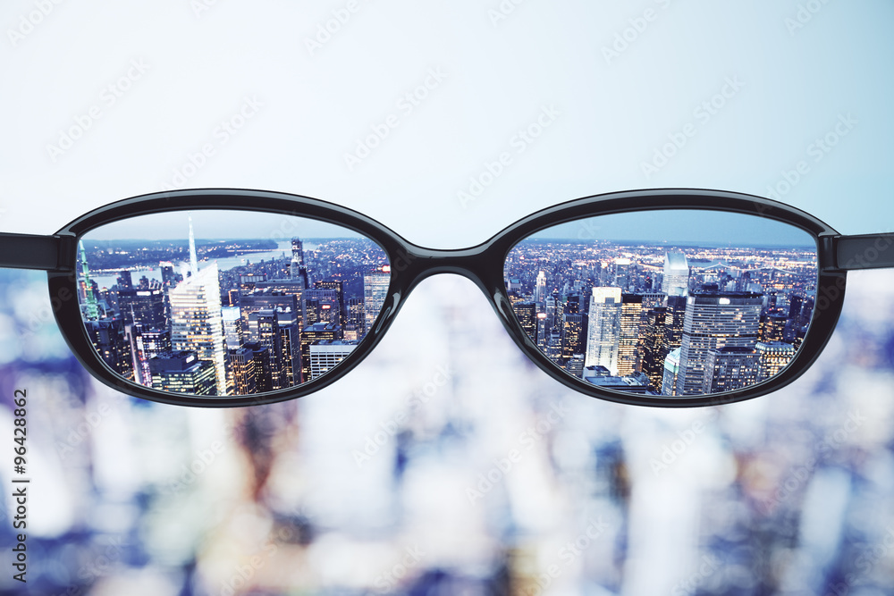 Clear vision concept with eyeglasses and night megapolis city ba