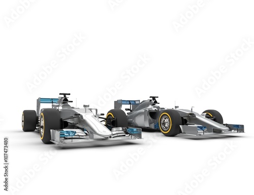  Metallic formula one cars - isolated on white background.