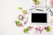 Workplace with tablet, pen, notebook, flowers and eyeglasses. Flat lay composition. Top view
Workplace with tablet, pen, notebook, flowers and eyeglasses. Flat lay composition. Top view