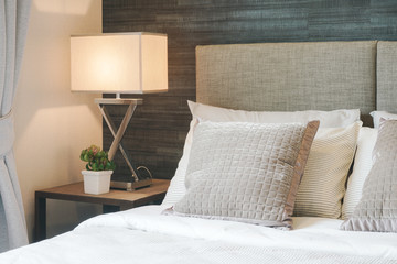 Hotel style bedding with white shade reading lamp