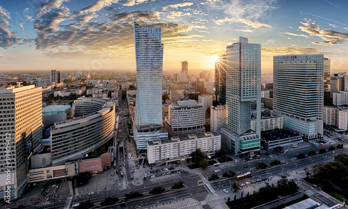 Fototapeta Warsaw city with modern skyscraper at sunset, Poland