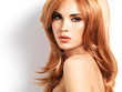 Closeup portrait of a beautiful woman with long straight red hai Closeup portrait of a beautiful woman with long straight red hai