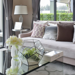 luxury earth tone color pillows on sofa in living room