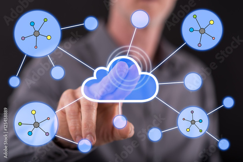 Man touching a cloud networking on a touch screen