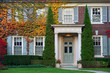 house with colorful vines in fall house with colorful vines in fall