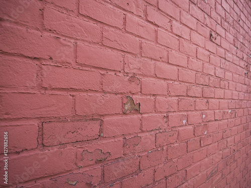 Red Brick Wall with peeling paint