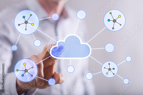 Man touching a cloud networking on a touch screen