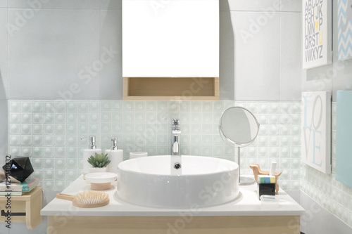  Interior of bathroom with sink basin faucet and mirror. Modern d
