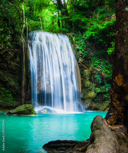 Fototapeta Erawan waterfall, the beautiful waterfall in forest at Erawan National Park - A beautiful waterfall on the River Kwai. Kanchanaburi, Thailand