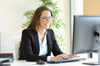 Businesswoman working wearing glasses Businesswoman working wearing glasses