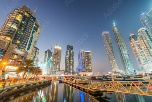 Dubai Marina night skyline along artificial canal, UAE