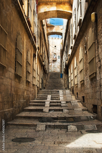  Old city street, stairs, stone stairway and arch. Jerusalem, Israel
